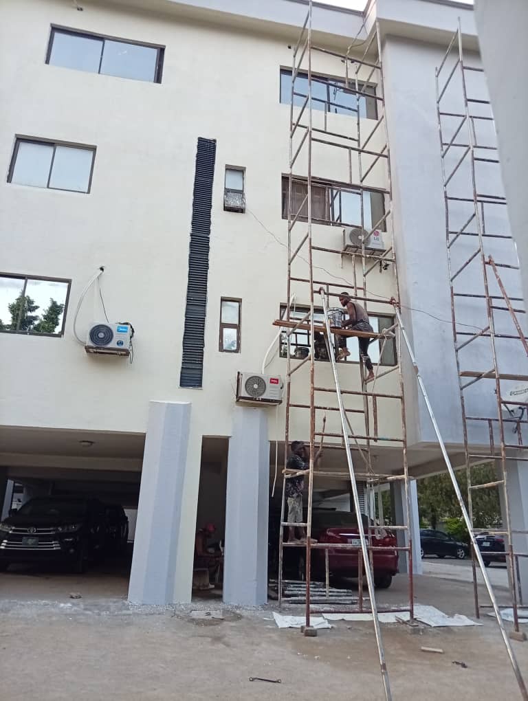 men working on another storey